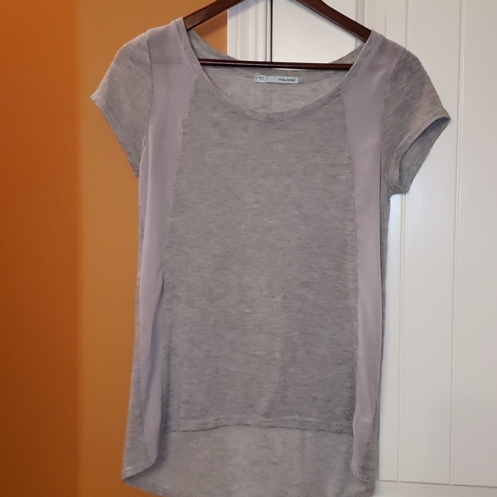 Sweater with sheer vertical strips. Tunic length